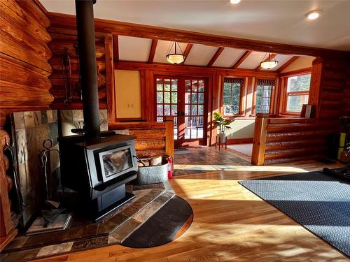 785 Beech Road, Nakusp, BC - Indoor Photo Showing Other Room With Fireplace