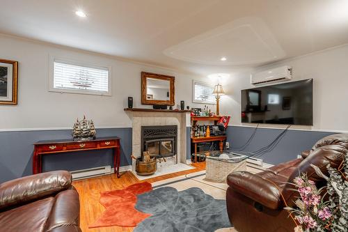 Salle familiale - 298 Grande Côte O., Lanoraie, QC - Indoor Photo Showing Living Room With Fireplace