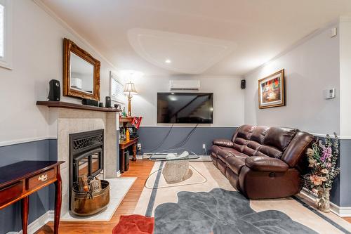 Salle familiale - 298 Grande Côte O., Lanoraie, QC - Indoor Photo Showing Living Room With Fireplace