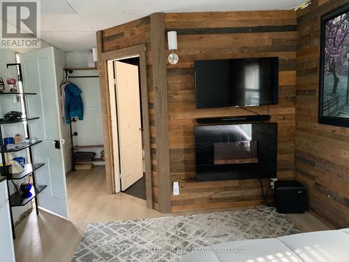 1714 County Rd 9, Greater Napanee (Greater Napanee), ON - Indoor Photo Showing Other Room With Fireplace