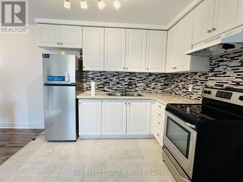 1 - 1448 Outlet Drive, Oshawa, ON - Indoor Photo Showing Kitchen With Double Sink