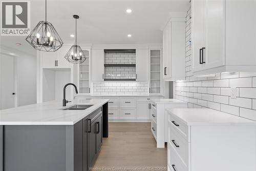 7355 Garnet, Mcgregor, ON - Indoor Photo Showing Kitchen With Double Sink With Upgraded Kitchen