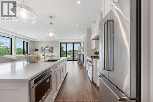 14400 Tecumseh Road Unit# 209, Tecumseh, ON - Indoor Photo Showing Kitchen With Double Sink With Upgraded Kitchen