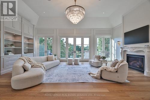 16 Eversley Hall, King, ON - Indoor Photo Showing Living Room With Fireplace