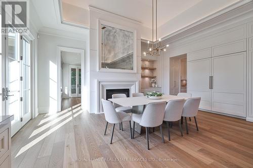 16 Eversley Hall, King, ON - Indoor Photo Showing Dining Room With Fireplace