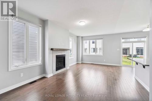 95 Mesa Drive, Ottawa, ON - Indoor Photo Showing Living Room With Fireplace