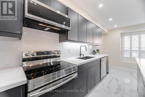 5935 Churchill Meadows Boulevard, Mississauga, ON - Indoor Photo Showing Kitchen With Stainless Steel Kitchen With Double Sink With Upgraded Kitchen