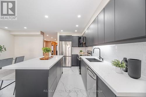 5935 Churchill Meadows Boulevard, Mississauga, ON - Indoor Photo Showing Kitchen With Stainless Steel Kitchen With Double Sink With Upgraded Kitchen