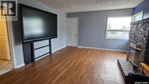 116 2Nd Avenue, Meacham, SK - Indoor Photo Showing Living Room With Fireplace