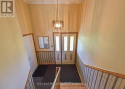 Split entranceway leading to main and lower levels - 