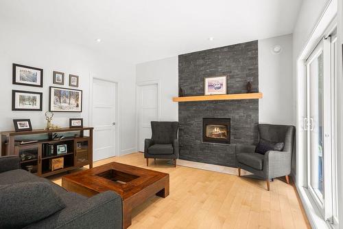 Living room - 37 Ch. Stephenson, Gore, QC - Indoor Photo Showing Living Room With Fireplace