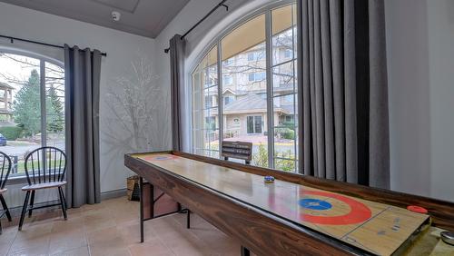 411-1962 Enterprise Way, Kelowna, BC - Indoor Photo Showing Other Room