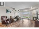 1963 Durnin Road Unit# 303, Kelowna, BC  - Indoor Photo Showing Living Room With Fireplace 