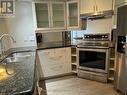 905 - 909 Bay Street, Toronto, ON  - Indoor Photo Showing Kitchen With Double Sink 
