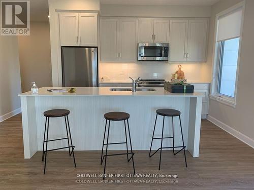301 - 150 Boundstone Way, Ottawa, ON - Indoor Photo Showing Kitchen With Double Sink