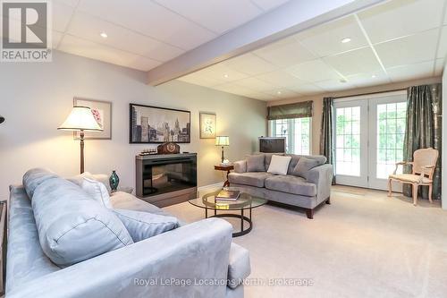 67 Greenway Drive, Wasaga Beach, ON - Indoor Photo Showing Living Room With Fireplace