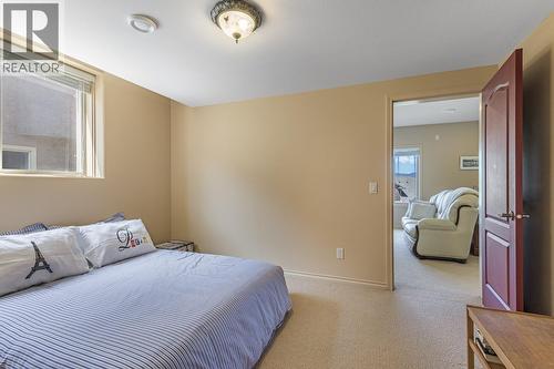 610 Arrowleaf Lane, Kelowna, BC - Indoor Photo Showing Bedroom