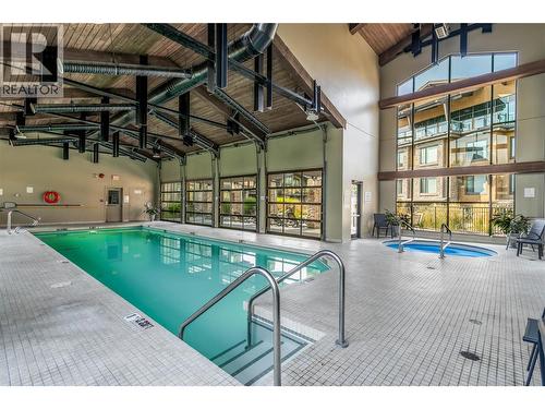 580 Sarsons Road Unit# 407, Kelowna, BC - Indoor Photo Showing Other Room With In Ground Pool