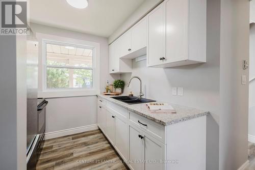 H - 201 North Park Street, Belleville (Belleville Ward), ON - Indoor Photo Showing Kitchen With Double Sink