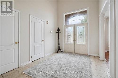 Double door entryway, to spacious  bright foyer . - 2348 Tesla Crescent, Oakville, ON - Indoor Photo Showing Other Room