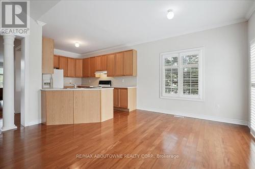 Kitchen and FR overlook premium oversize rear yard - 2348 Tesla Crescent, Oakville, ON - Indoor Photo Showing Kitchen
