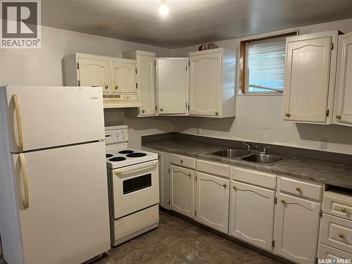 345 19Th Street E, Prince Albert, SK - Indoor Photo Showing Kitchen With Double Sink