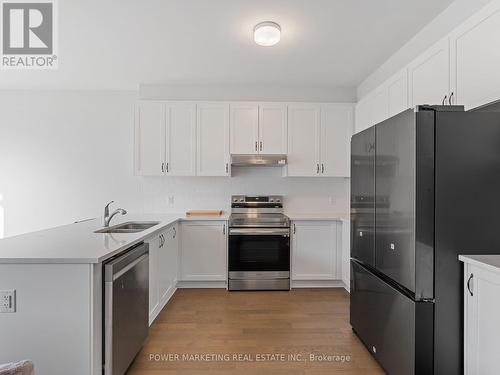 1017 Curraglass Walk, Ottawa, ON - Indoor Photo Showing Kitchen With Double Sink