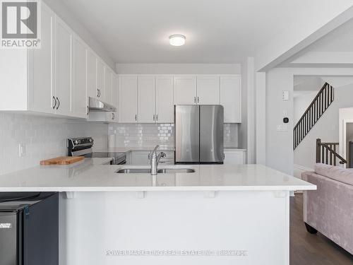 1017 Curraglass Walk, Ottawa, ON - Indoor Photo Showing Kitchen With Double Sink