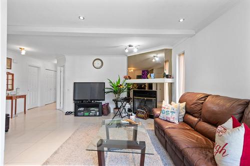 Living room - 1004 Rue Thierry, Montréal (Lasalle), QC - Indoor Photo Showing Living Room With Fireplace