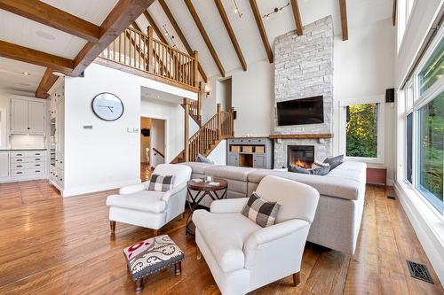 Vue d'ensemble - 5 Rue Champoux, Sainte-Béatrix, QC - Indoor Photo Showing Living Room With Fireplace