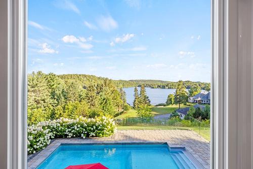 Vue sur l'eau - 5 Rue Champoux, Sainte-Béatrix, QC -  With In Ground Pool