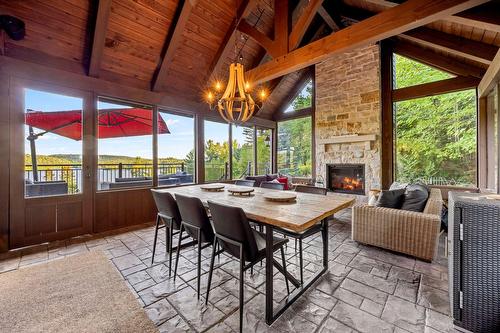 Solarium/Verrière - 5 Rue Champoux, Sainte-Béatrix, QC - Indoor Photo Showing Dining Room With Fireplace