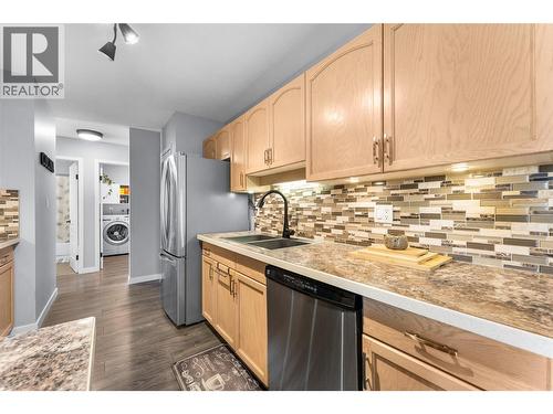3163 Richter Street Unit# 413, Kelowna, BC - Indoor Photo Showing Kitchen With Double Sink