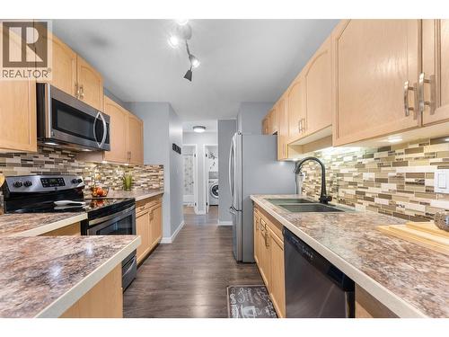 3163 Richter Street Unit# 413, Kelowna, BC - Indoor Photo Showing Kitchen With Double Sink With Upgraded Kitchen