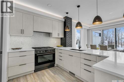 428 Woolf Bend, Saskatoon, SK - Indoor Photo Showing Kitchen With Upgraded Kitchen