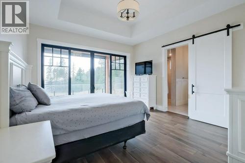 7839 Falcon Ridge Crescent, Kelowna, BC - Indoor Photo Showing Bedroom