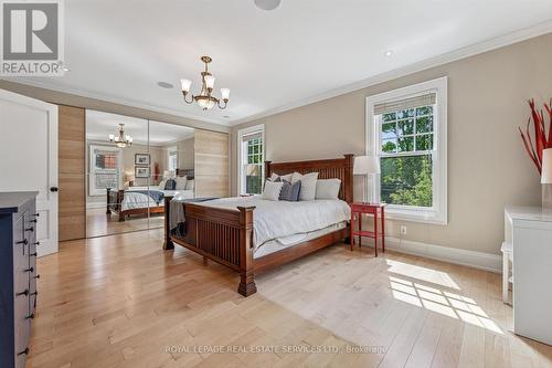 Bright Primary Bedroom Offering Hardwood Flooring - 335 Lakeshore Road W, Oakville, ON - Indoor Photo Showing Bedroom