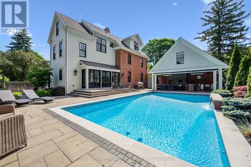 19' x 36' Saltwater Pool and Natural Stone Patio - 335 Lakeshore Road W, Oakville, ON - Outdoor With In Ground Pool With Deck Patio Veranda