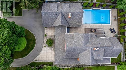 Aerial View of the Property - 335 Lakeshore Road W, Oakville, ON - Outdoor With In Ground Pool