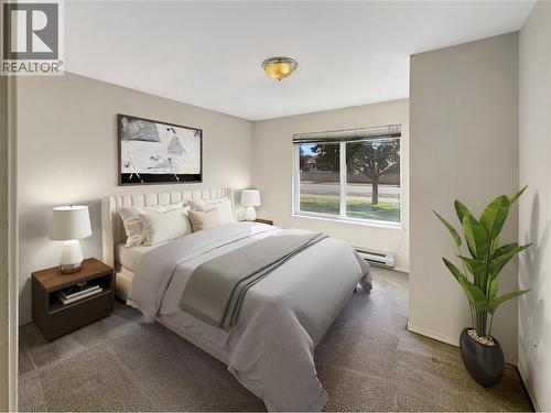 Virtually Staged - 1004 23 Avenue N Unit# 113, Cranbrook, BC - Indoor Photo Showing Bedroom
