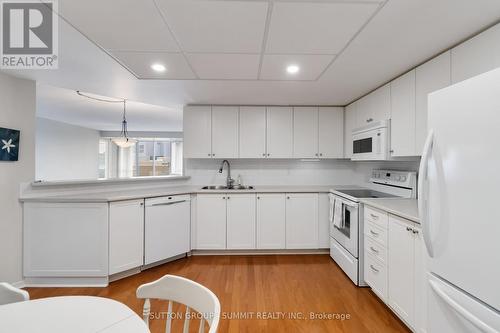 807 - 1201 North Shore Boulevard E, Burlington, ON - Indoor Photo Showing Kitchen With Double Sink