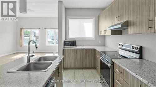 28 Mclaughlin Street, Welland, ON - Indoor Photo Showing Kitchen With Double Sink