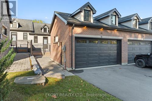 Double car garage - 45 Bentley Crescent, Prince Edward County (Picton Ward), ON - Outdoor With Facade