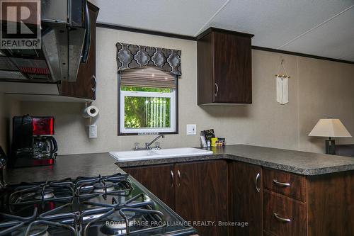 486 County Rd 18 - 8 Butterfly Lane, Prince Edward County (Athol Ward), ON - Indoor Photo Showing Kitchen With Double Sink