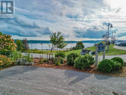 lots of parking & gardens - 103 - 11B Salt Dock Road, Parry Sound, ON - Outdoor With Body Of Water With View