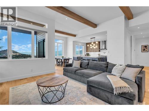 Living room, dinning room, kitchen, open and bright with 11 foot ceilings. - 3044 Shaleview Drive, West Kelowna, BC - Indoor Photo Showing Living Room