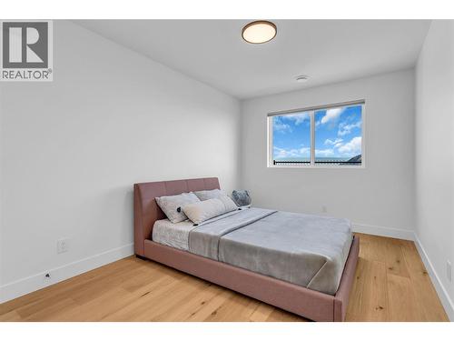 Large 14' X 10' bedroom on lower floor. - 3044 Shaleview Drive, West Kelowna, BC - Indoor Photo Showing Bedroom
