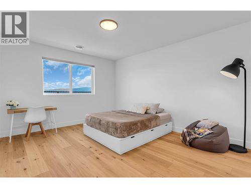 2nd large bedroom on lower floor with walk in closet and private ensuite. - 3044 Shaleview Drive, West Kelowna, BC - Indoor Photo Showing Bedroom