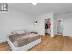 2nd large bedroom on lower floor with walk in closet and private ensuite. - 