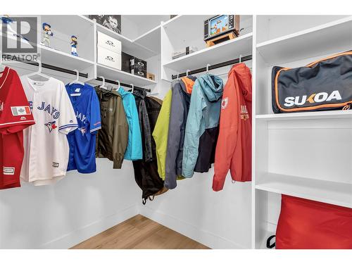 Walk in closet for the bedroom with the ensuite on the lower floor. - 3044 Shaleview Drive, West Kelowna, BC - Indoor With Storage